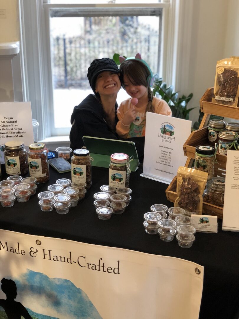 rochelle at a local show selling granola